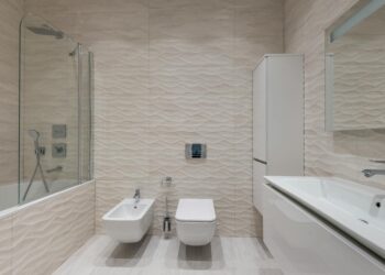 Elegant modern bathroom with minimalist design and stylish fixtures.