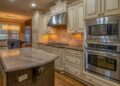 A stylish kitchen featuring stainless steel appliances and luxurious counter space.